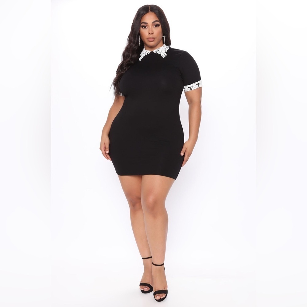 Wednesday Collar Body Sculpting Dress
- Black/Ivory NWT 109.00 Costume